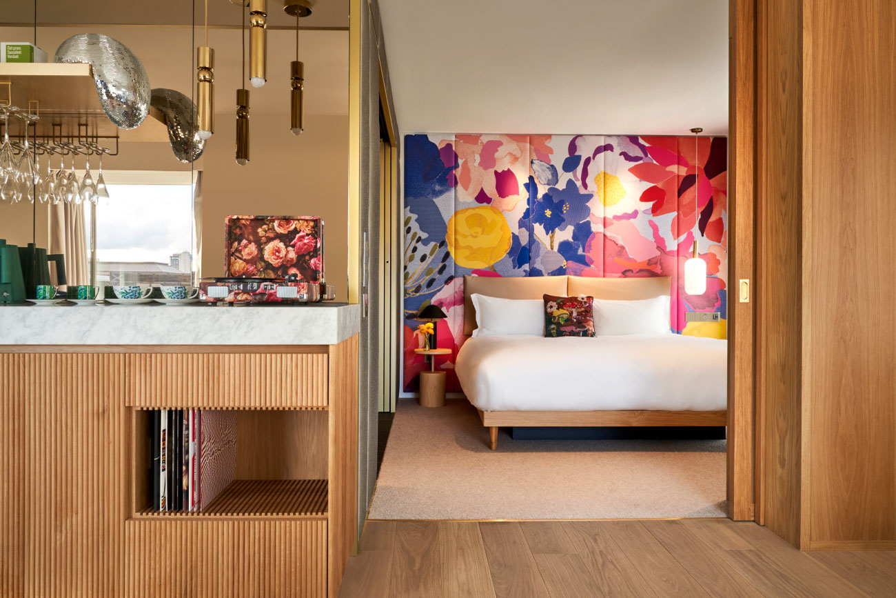 Integrated hotel technology and telecoms for 5-star service body image showing a hotel room