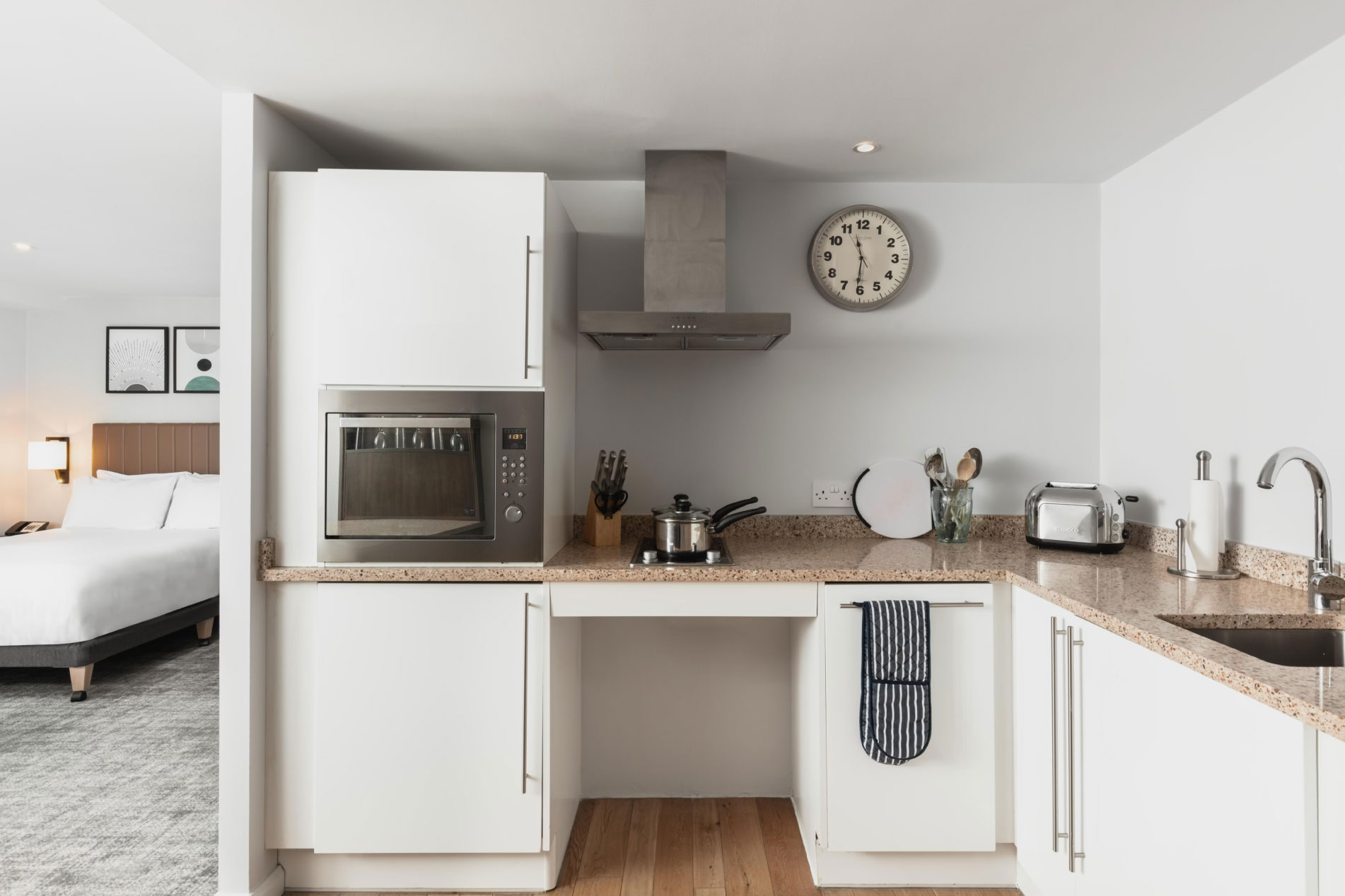 Maximising bandwidth and reliability with a dual-provider internet upgrade body image showing a hotel room with a kitchen